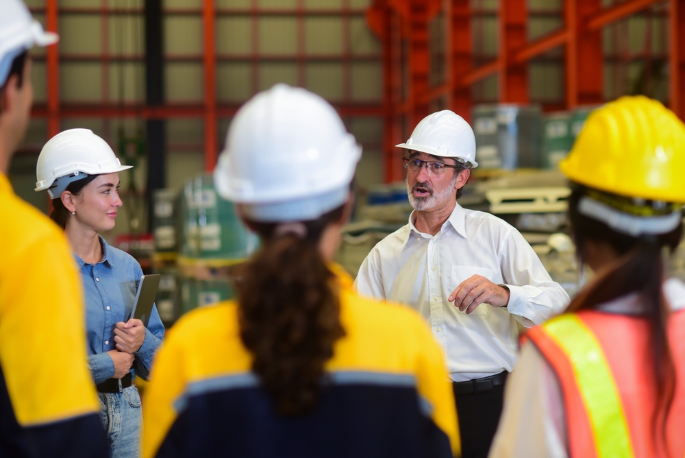 types of industrial engineers standing in a group talking