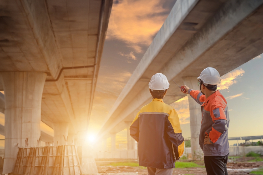 two construction project managers observing project